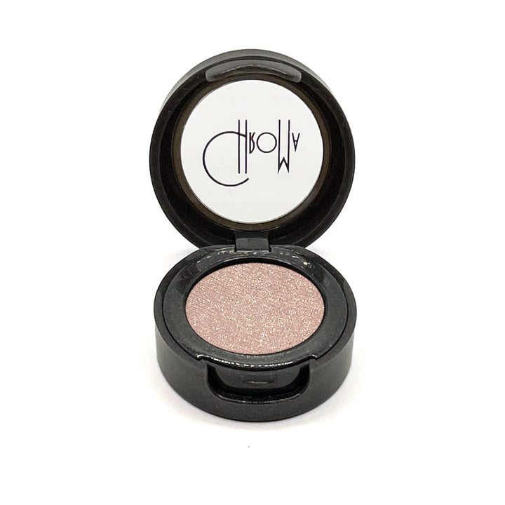 Pale peach with gold sparkles.